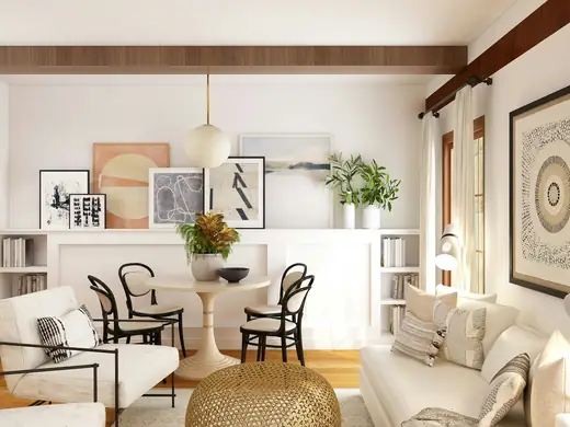 Tidy living and dining room with white furniture